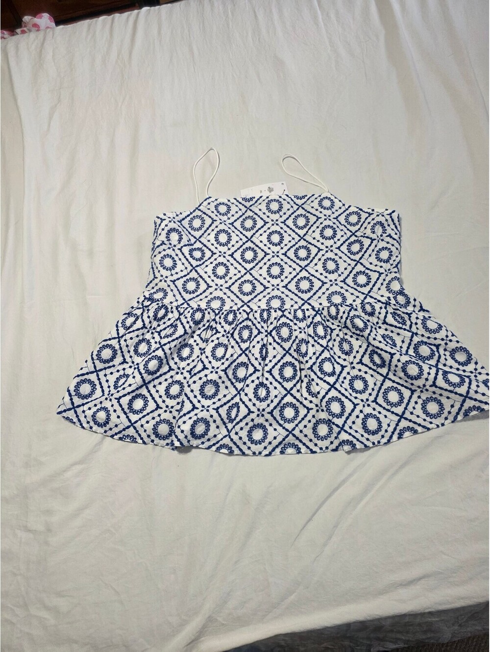 Blue & white eyelet top with peplum design